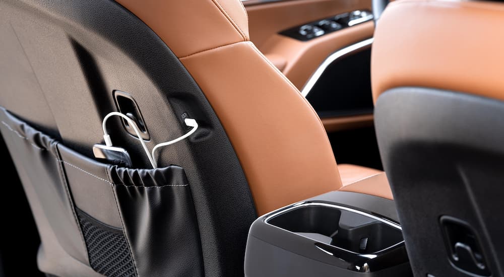 Rear seat pocket and charging port in a 2025 Kia Telluride X-Pro.