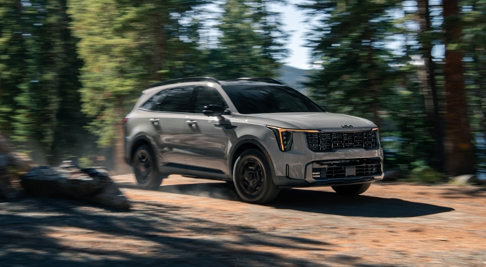 A grey 2025 Kia Sorento from the front at an angle.