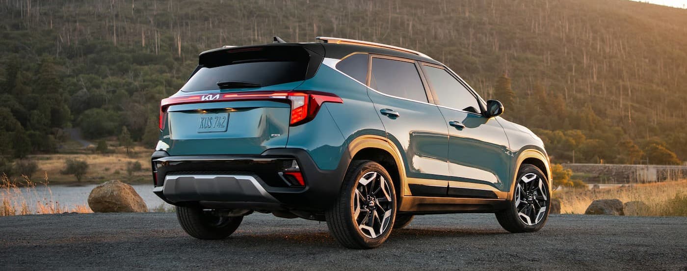 A blue 2026 Kia Seltos parked on a sunny day..